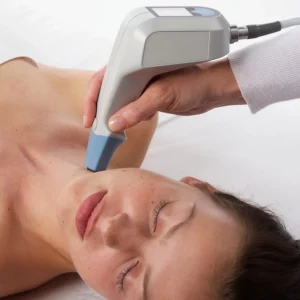 woman having facial treatment on her face